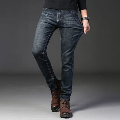 Stylish men's slim fit washed blue jeans for everyday casual wear. Comfortable stretch denim.