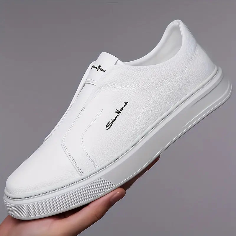 Sleek brown men's slip-on sneakers with a modern finish. Ideal comfortable casual footwear.