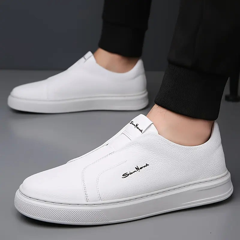 Side view of a modern men's slip-on sneaker, showcasing its comfortable, streamlined design.