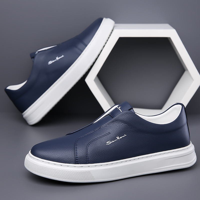 Brown men's slip-on sneakers. Stylish & comfortable casual footwear for modern men.