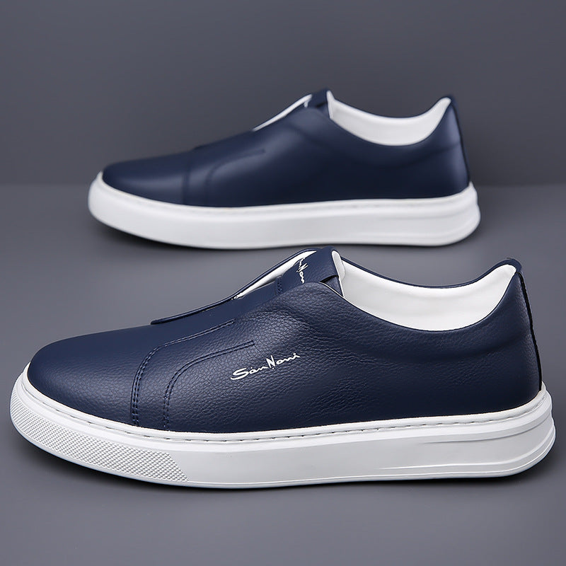 Navy blue men's no-lace sneakers. Effortless comfort & modern fashion for walking.
