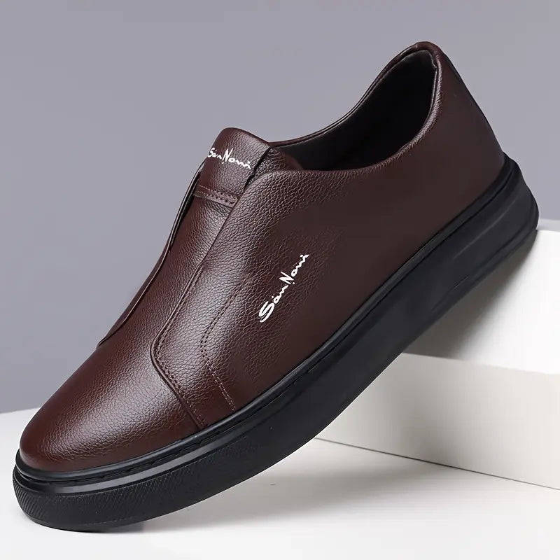 Comfortable men's casual slip-on shoes for daily walking. Modern, no-lace design.