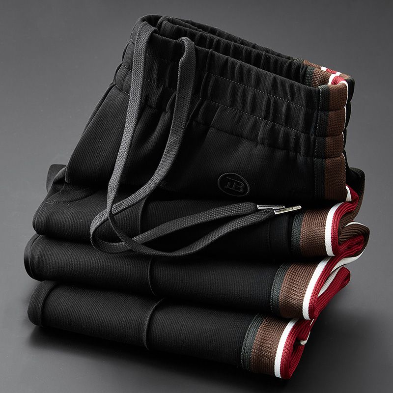 Men's everyday spliced pants, offering a comfortable fit & modern style for casual wear.