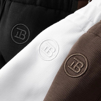 Relaxed fit men's spliced casual pants, great for comfort, style & versatile urban fashion.