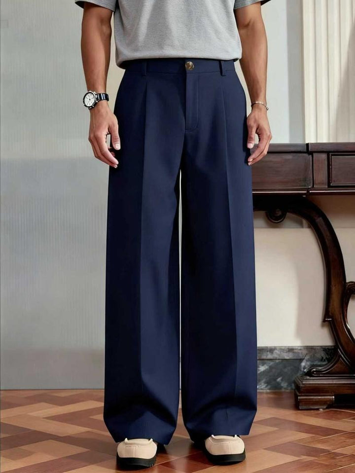Sophisticated men's wool blend wide leg trousers. Monaco pleated dress pants ideal for formal & casual chic looks.