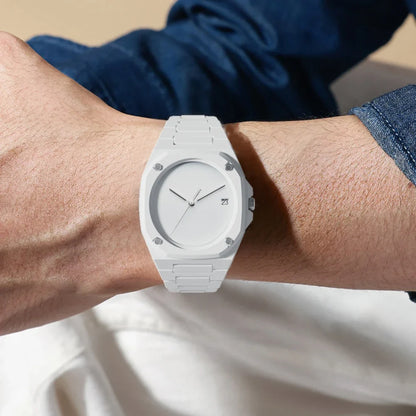 Minimalist men's monochrome watch dial with clear date display, elegant geometric design for a modern look.