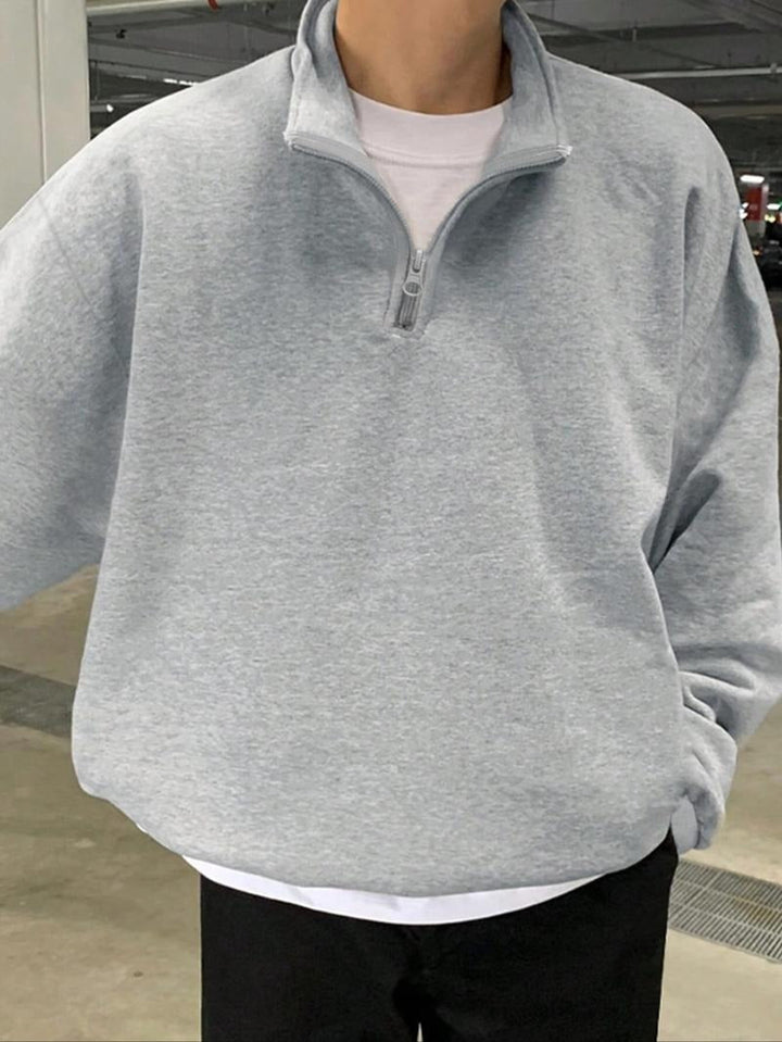 Versatile men's half zip pullover sweatshirt. Modern fit long sleeve for stylish layering & casual fashion.
