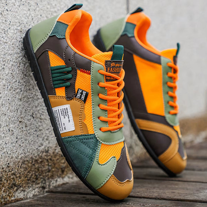 Vibrant men's athletic sneakers, multi-panel design perfect for streetwear & everyday wear.
