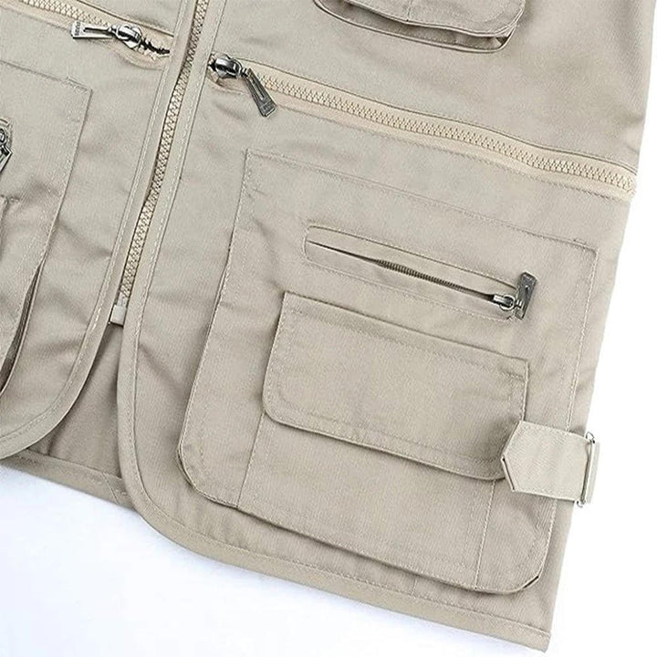 Rugged men's outdoor gear vest for adventure. Multi-pocket design keeps essentials secure for exploration.