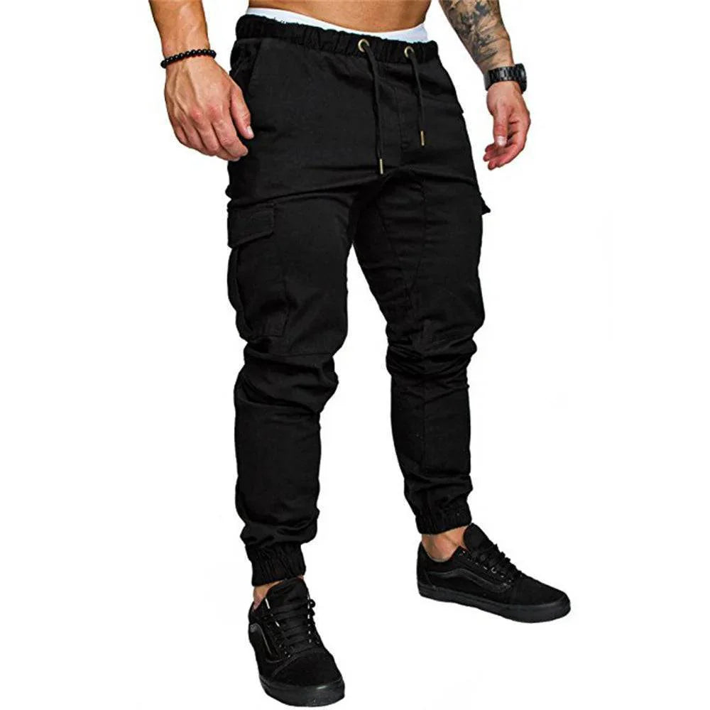 Men's outdoor pants with articulated knees and multiple cargo pockets, designed for active use