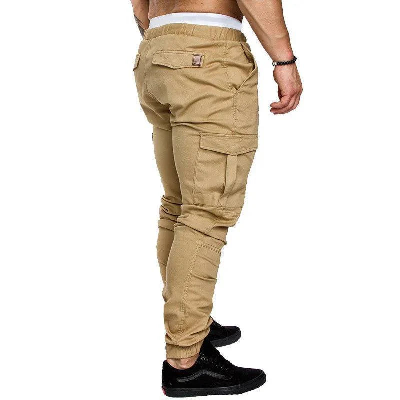 Full shot of elastic waist men's cargo pants in khaki, multiple pockets, for outdoor activities