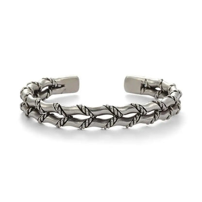 Men's natural wood & stainless steel Cuban link bracelet. Modern, elegant, and adjustable jewelry accessory.