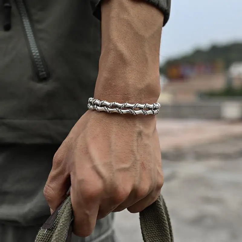 Elegant men's bracelet blending natural wood elements with a polished stainless steel Cuban link. Adjustable.