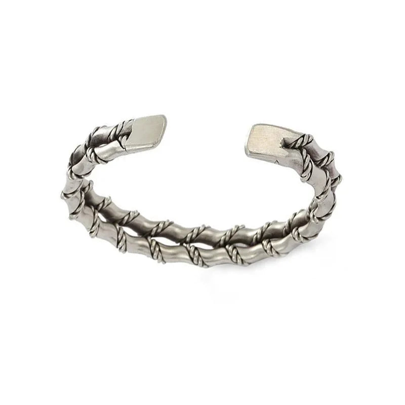Refined men's natural wood and stainless steel bracelet with an adjustable Cuban link design for style.