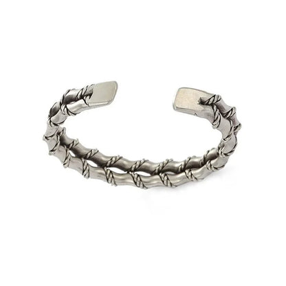 Refined men's natural wood and stainless steel bracelet with an adjustable Cuban link design for style.