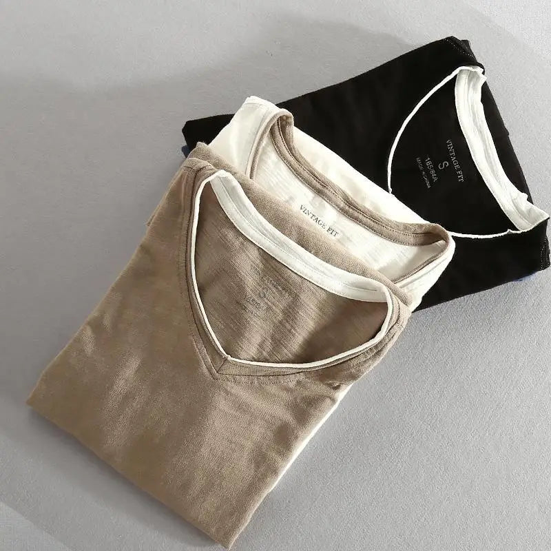 Modern men's V-neck casual shirt, ultimate comfort & style for versatile everyday fashion. Short sleeve design.