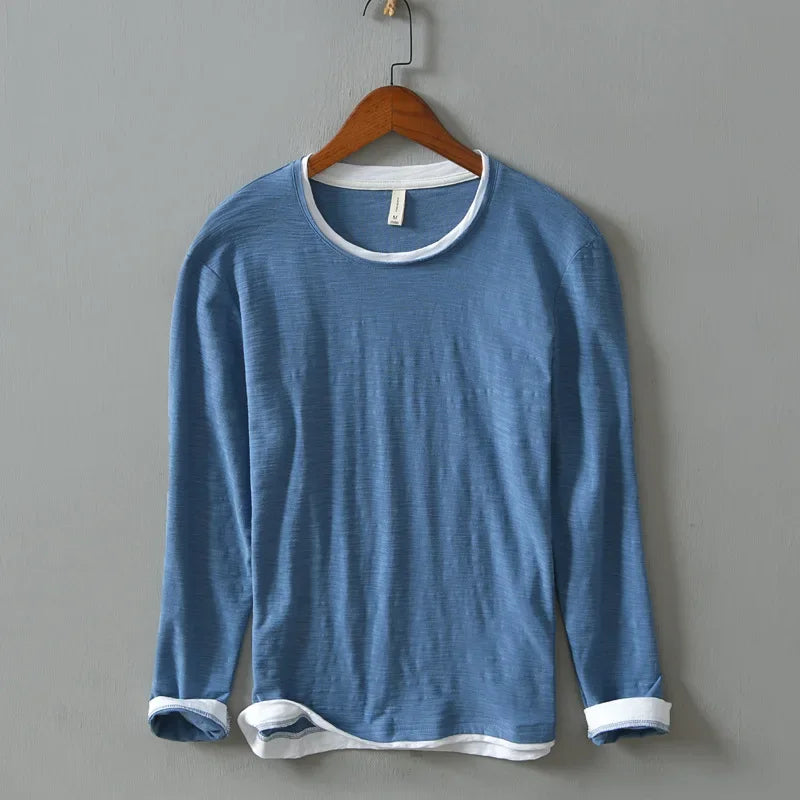 Men's Nightfall vintage blue long sleeve button-down shirt. Relaxed fit casual menswear.