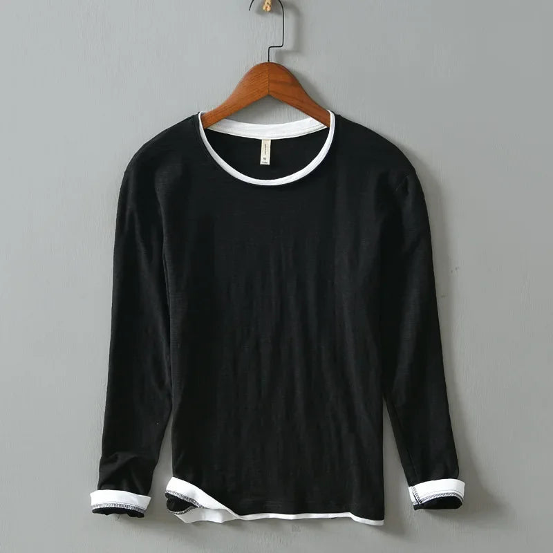 White Nightfall men's vintage long sleeve button-down shirt. Relaxed fit, ideal for casual comfort.