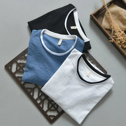 Casual men's Nightfall long sleeve blue button-down shirt. Vintage style, relaxed fit for everyday comfort.