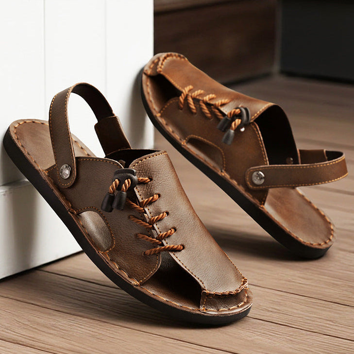 Men's Nomad slip-on comfort sandals with ergonomic footbed, featuring a secure adjustable cross-strap.