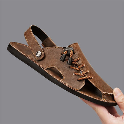 Open-toe men's Nomad summer sandals in brown, showcasing the comfortable cross-wrap design and durable sole.