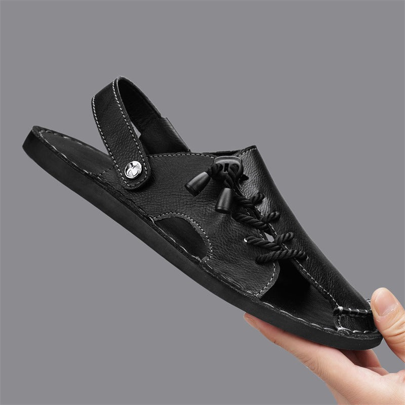 A man's feet wearing Nomad cross-wrap comfort sandals, demonstrating the secure fit and stylish open-toe design.