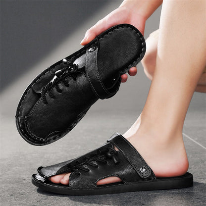 Pair of versatile Nomad men's slip-on sandals, ideal comfort footwear with an easy cross-wrap adjustable strap.