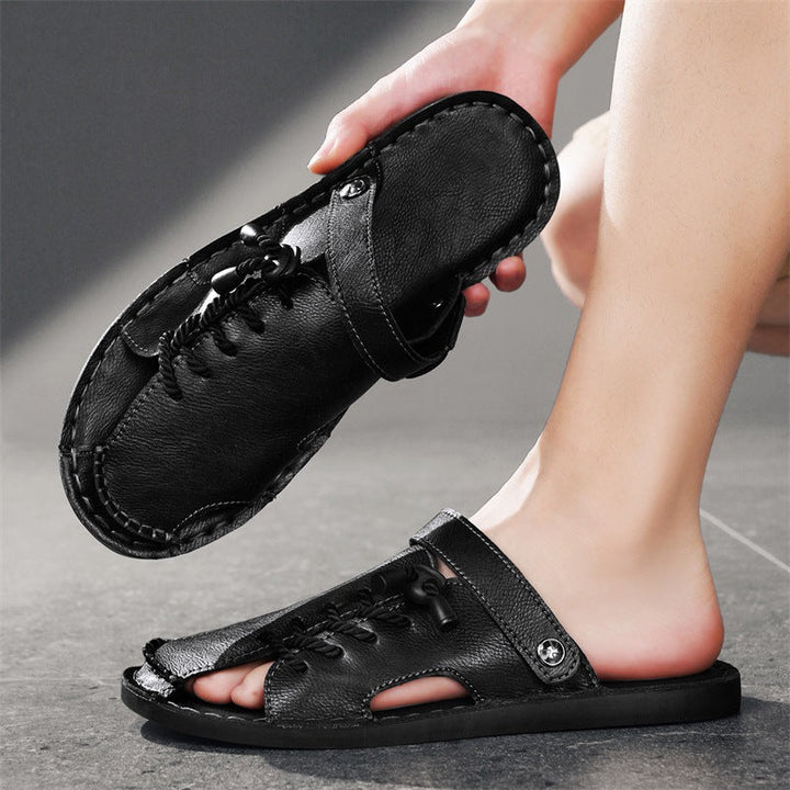Pair of versatile Nomad men's slip-on sandals, ideal comfort footwear with an easy cross-wrap adjustable strap.