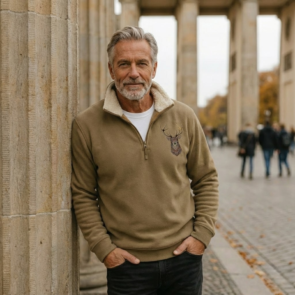 Men's Nordic deer motif quarter-zip sweater, perfect for winter warmth and stylish outdoor wear.