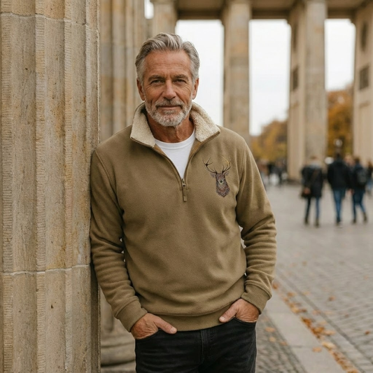 Men's Nordic deer motif quarter-zip sweater, perfect for winter warmth and stylish outdoor wear.