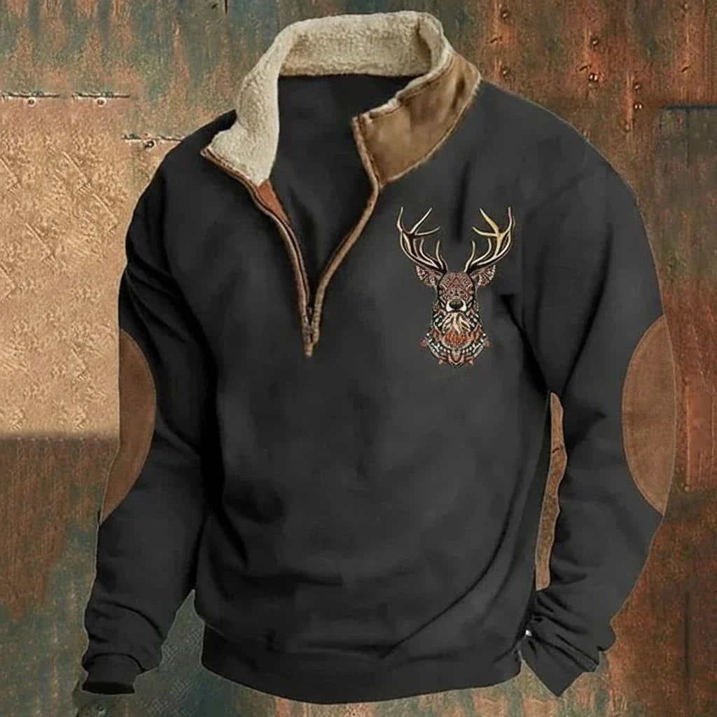 Stylish men's quarter-zip sweater with classic Nordic deer design, offering warmth for winter activities.