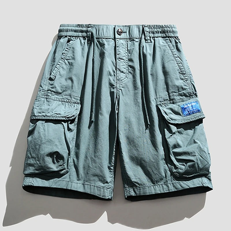 Navy men's cargo shorts with deep utility pockets, comfortable & durable for summer outdoor activities.