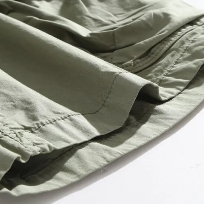 Stretch men's cargo shorts for ultimate comfort & movement during summer outdoor adventures & casual wear.