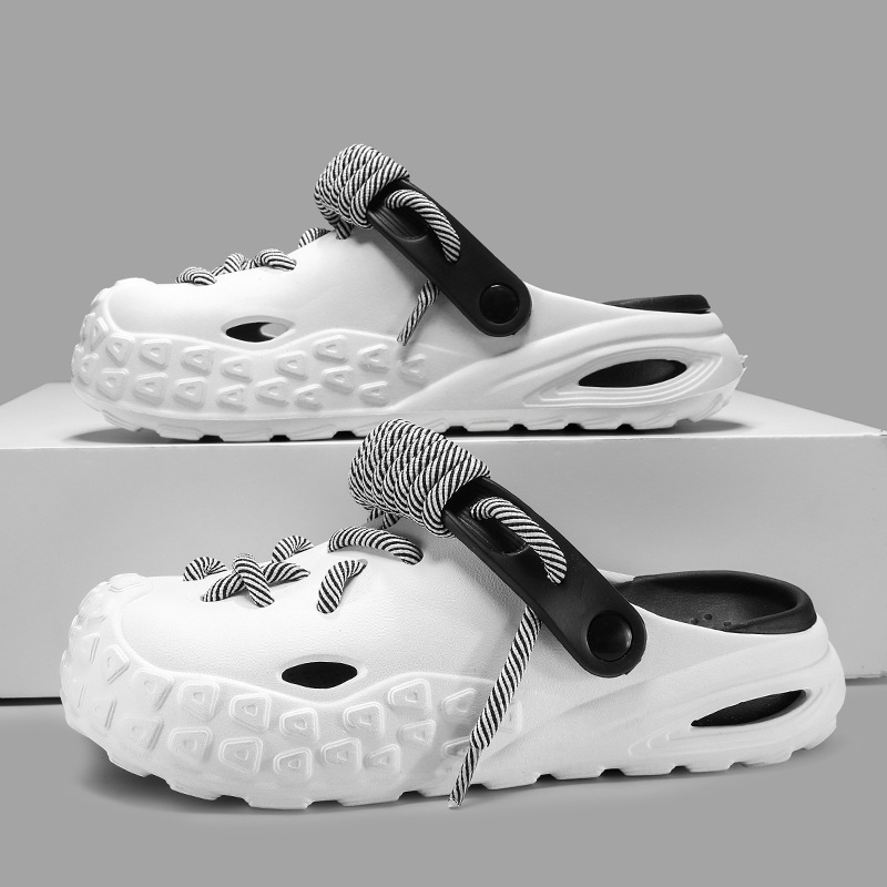Water-friendly men's footwear, Odyssey Laced Clogs, great for outdoor adventures.