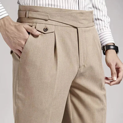 Back view of men's pleated dress trousers, old money style, highlighting pockets & tailored fit.