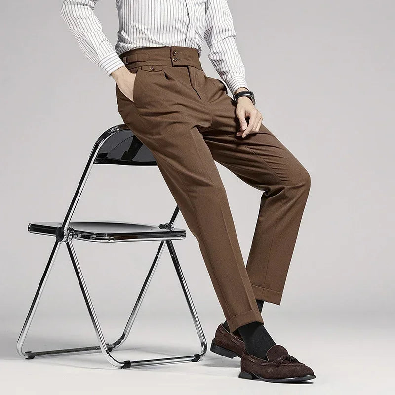 Brown men's pleated dress trousers, old money style, tailored fit with adjustable waist.
