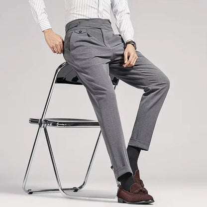 Close-up of fabric on men's old money pleated trousers, showcasing quality & tailored fit.