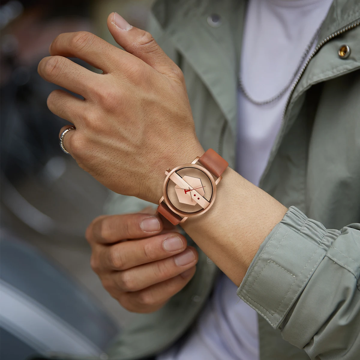 Elegant men's Orbit Dial Watch with unique open dial, presented against a clean background.