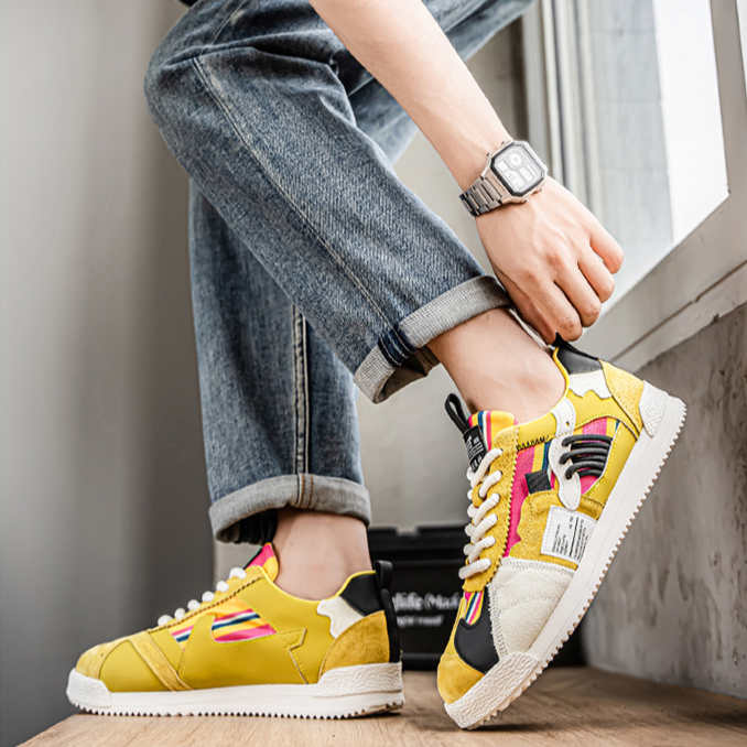 Men's Orbital multi-tone Y2K athletic sneakers, retro skate style for casual wear.