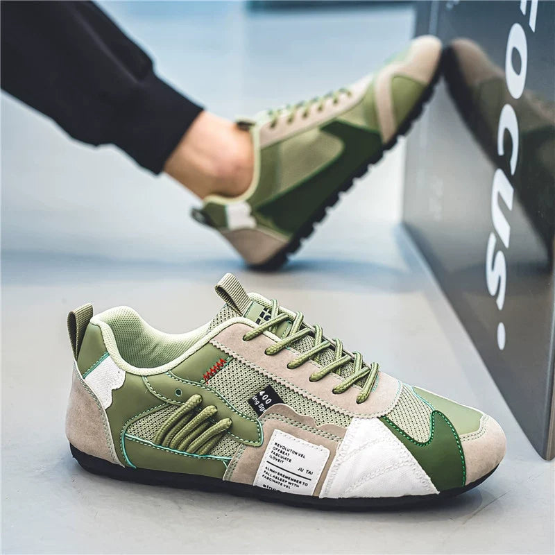 Comfortable men's green utility sneakers, a versatile addition to men's active lifestyle.