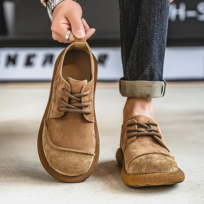 Stylish mens comfort shoes; brown leather loafers offering orthopedic support for casual outings.