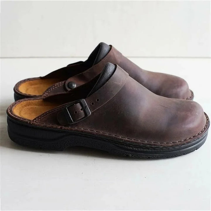 Slip-on men's closed-toe walking sandals, offering orthopedic arch support for active comfort.