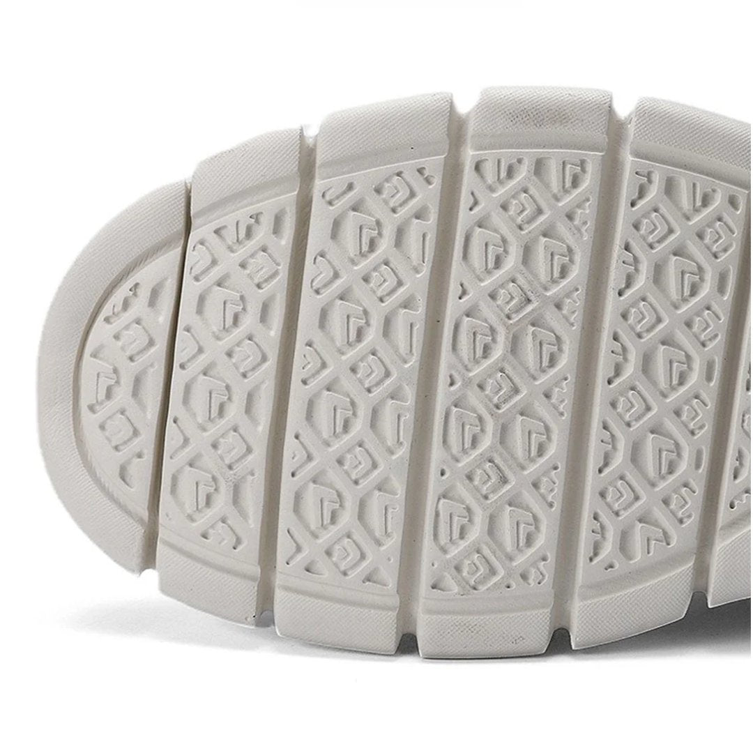 Anti-slip outsole of men's orthopedic walking shoes, providing secure grip & foot support.