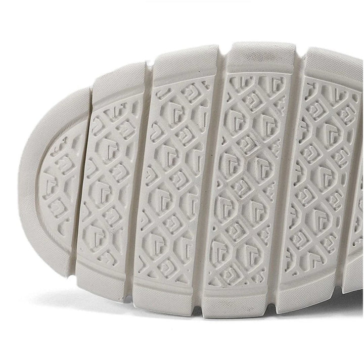 Anti-slip outsole of men's orthopedic walking shoes, providing secure grip & foot support.