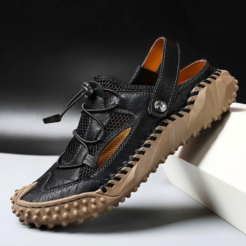 Gray men's hybrid sandals, offering adjustable fit & comfort for active outdoor recreation & summer wear.