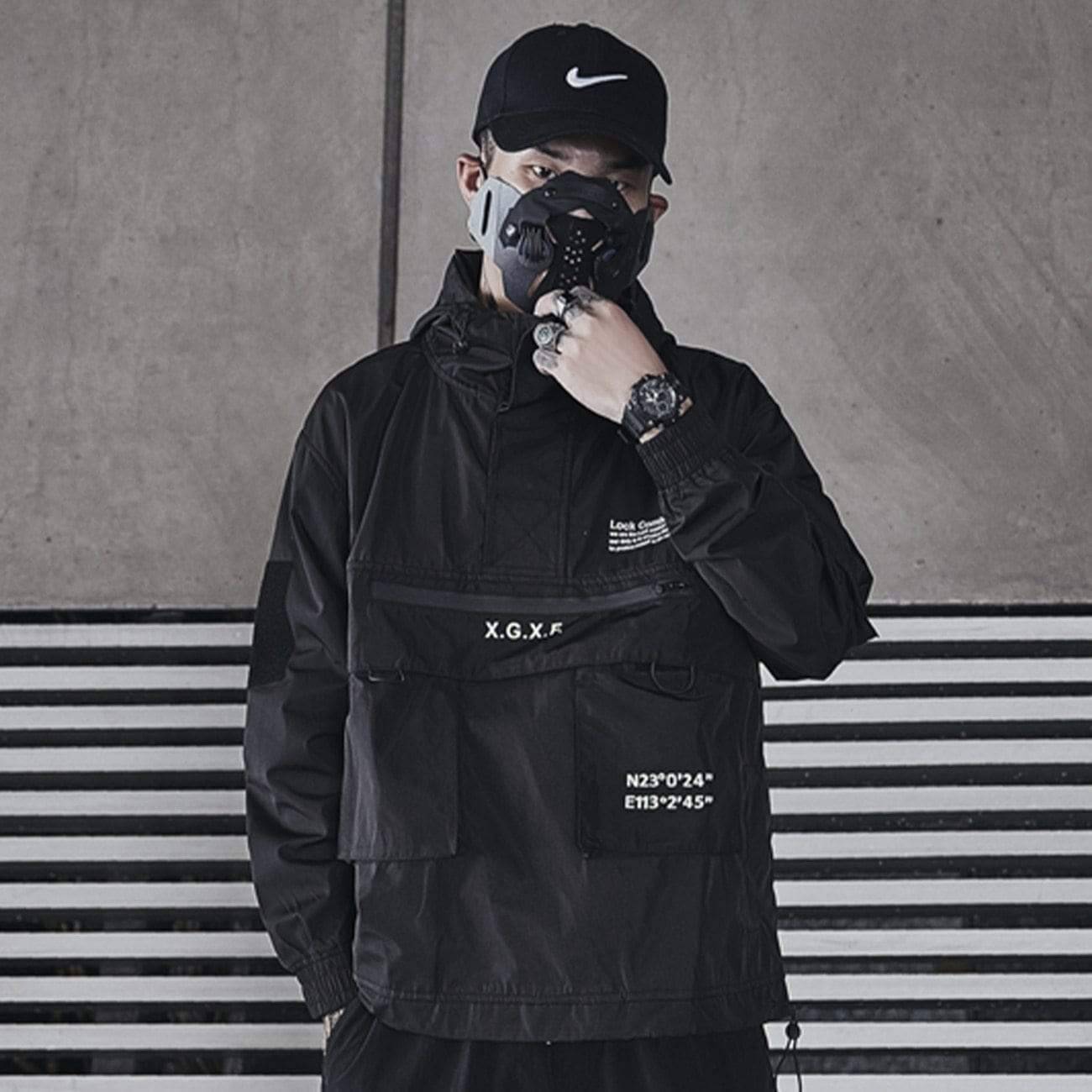 Men's outdoor tactical cargo jacket with hood, multiple pockets, and weather-resistant fabric