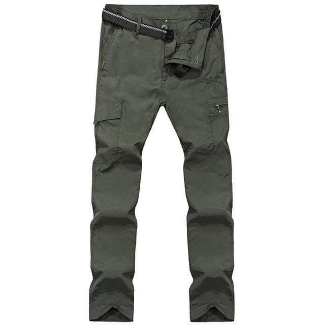 Close-up of mens tactical hiking cargo pants fabric, showing reinforced knees and utility pockets.