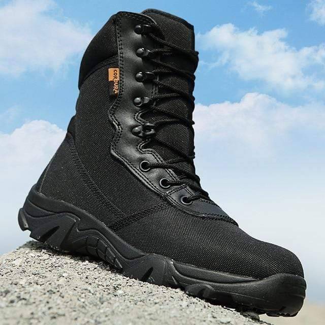 Front view of men's durable hiking boots, essential gear for outdoor adventure activities