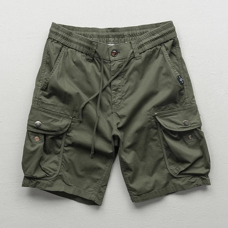 Active man wearing comfortable Palermo cargo shorts, ideal for versatile summer adventures & casual style.