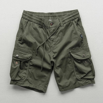 Active man wearing comfortable Palermo cargo shorts, ideal for versatile summer adventures & casual style.